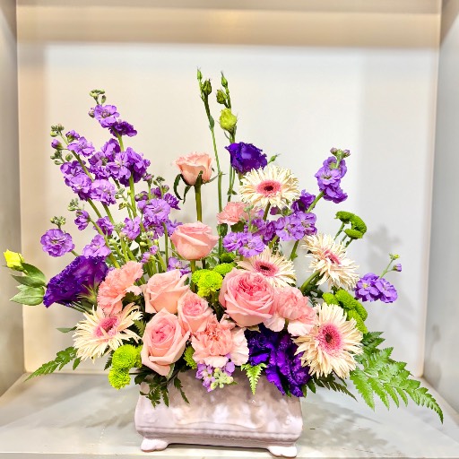 Arreglo floral tonos lilas 