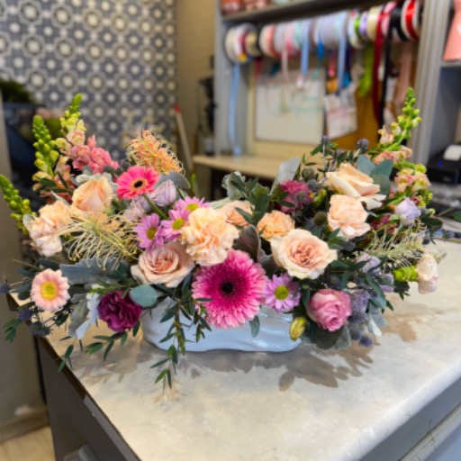 Arreglo floral tonos cálidos 