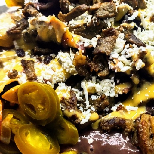 NACHOS CON FILETE DE RES