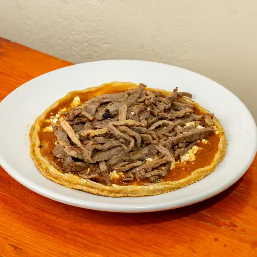 Picada con carne