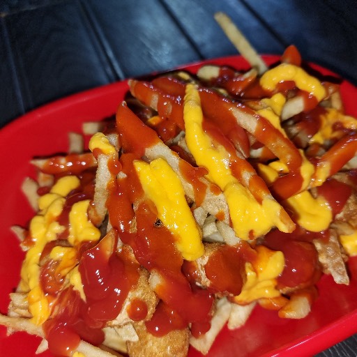 CHILAPOP’S  papas a la francesa, con 15 palomitas de pollo